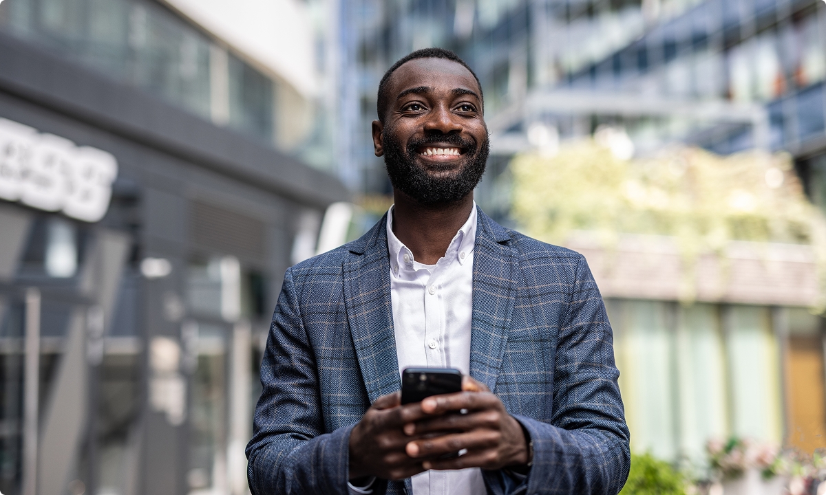 Happy lawyer using phone