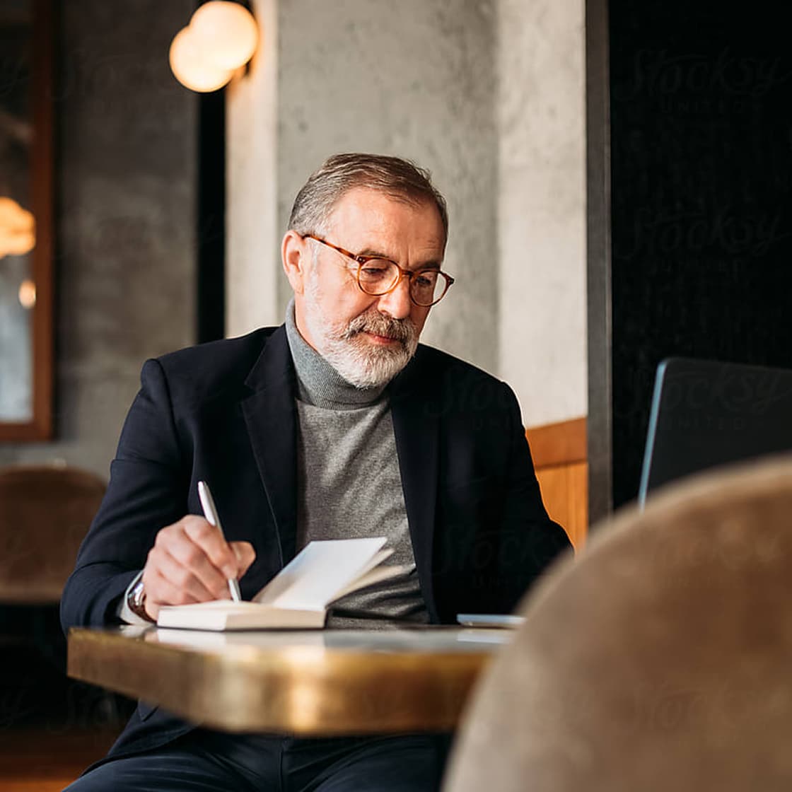 Male lawyer taking notes