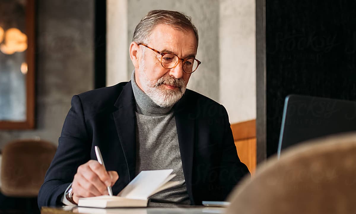 Male lawyer taking notes