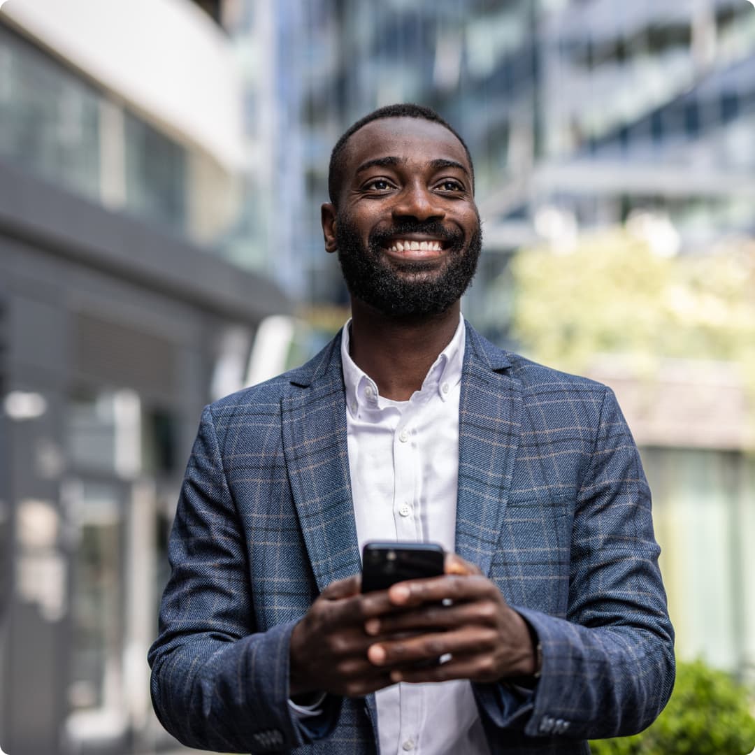 Happy lawyer using phone