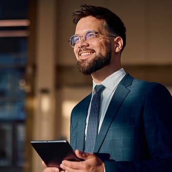 optimistic lawyer holding a tablet