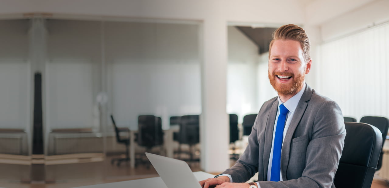 male professional with laptop