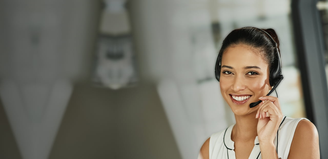 Female receptionist speaking over headset