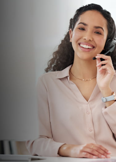 Female receptionist speaking over headset